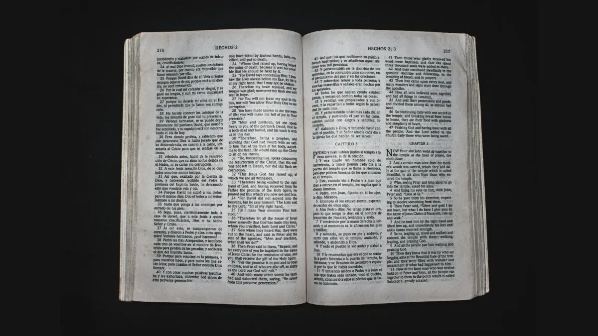Open Bible on a jet black background